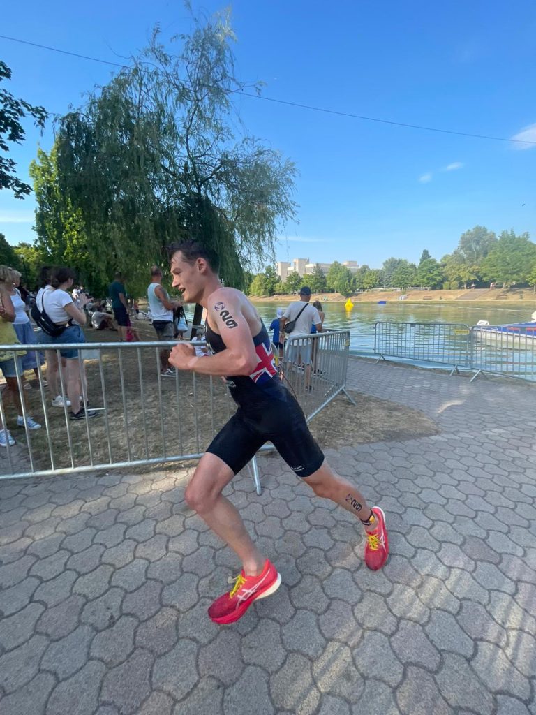 Dominic rounding a corner on the run